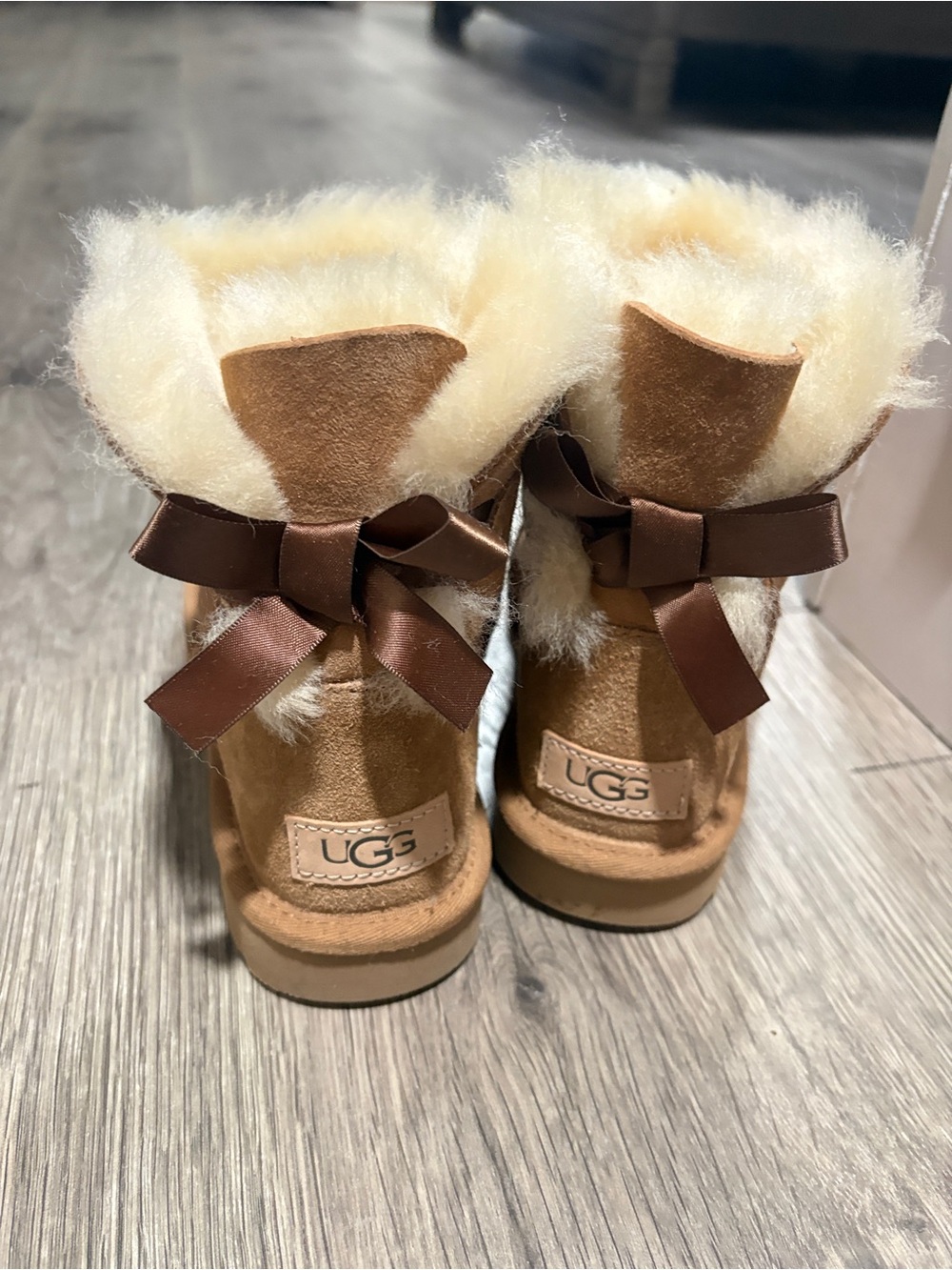 UGG Kids Chestnut Suede Boots with Cream Fur Trim and Brown Bows